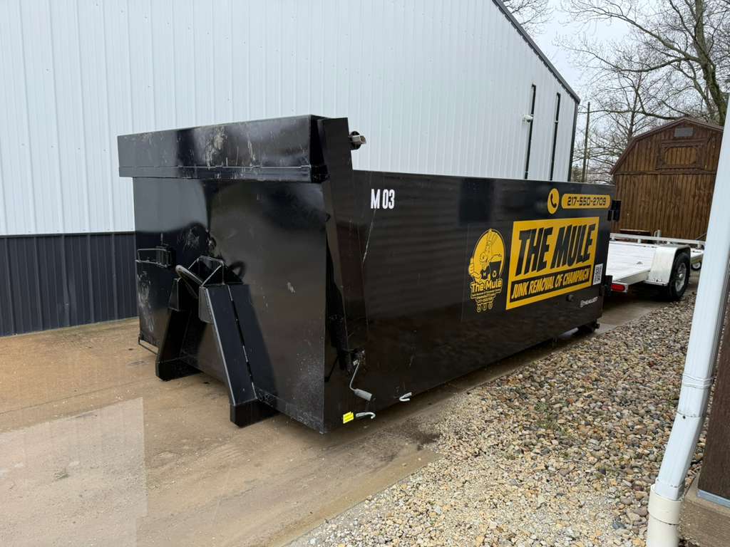 Dumpster rental service in Champaign IL — The Mule Junk Removal roll-off dumpster trailer